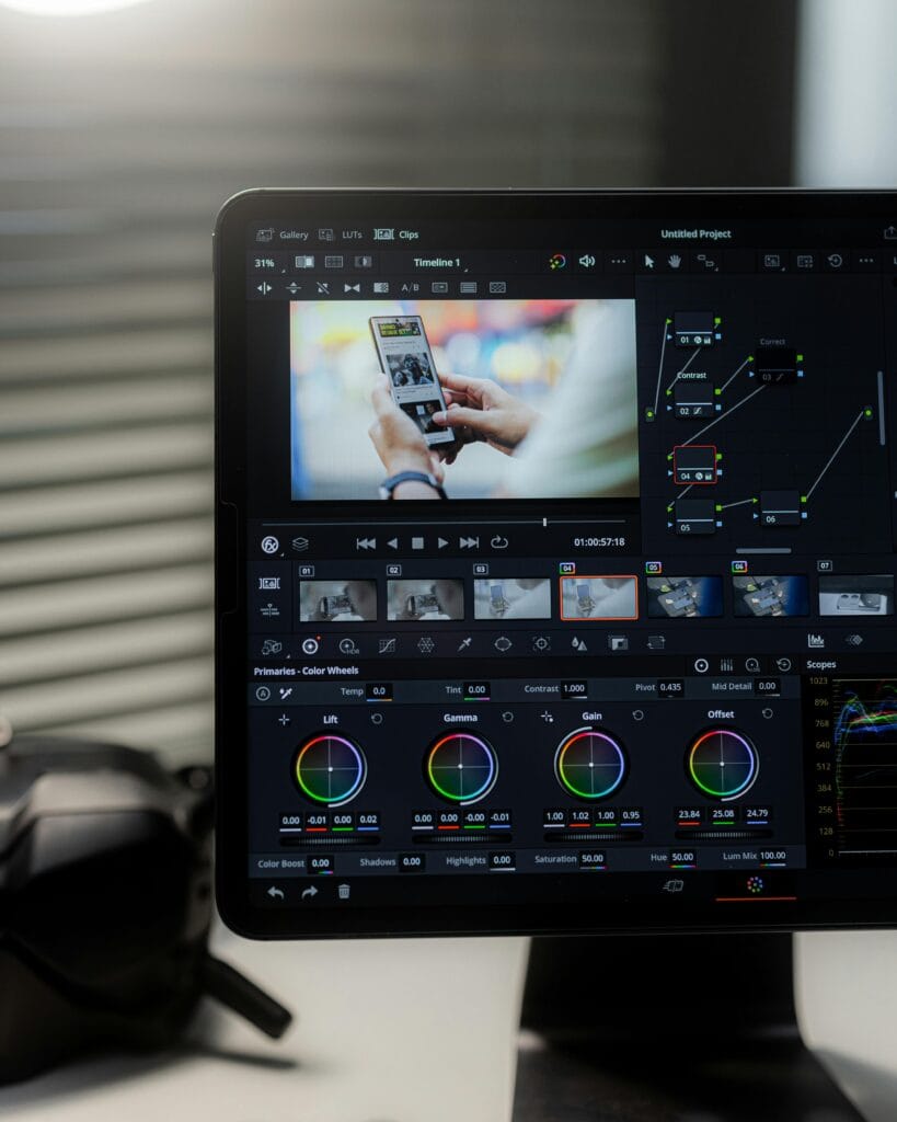 Audio Video Editing process at Clickin with an editor working on computer